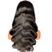 Black wavy hair extension on a mannequin head against a white background