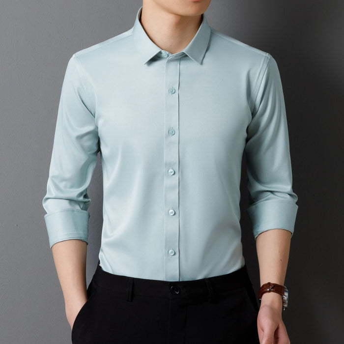 Light blue dress shirt worn by a person on a dark background