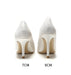 Two white high-heeled shoes with heel heights labeled 7CM and 9CM on a white background.