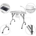 Portable folding table with solar panel and lamp on a white background