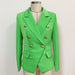 Green blazer with gold buttons on a mannequin against a white background