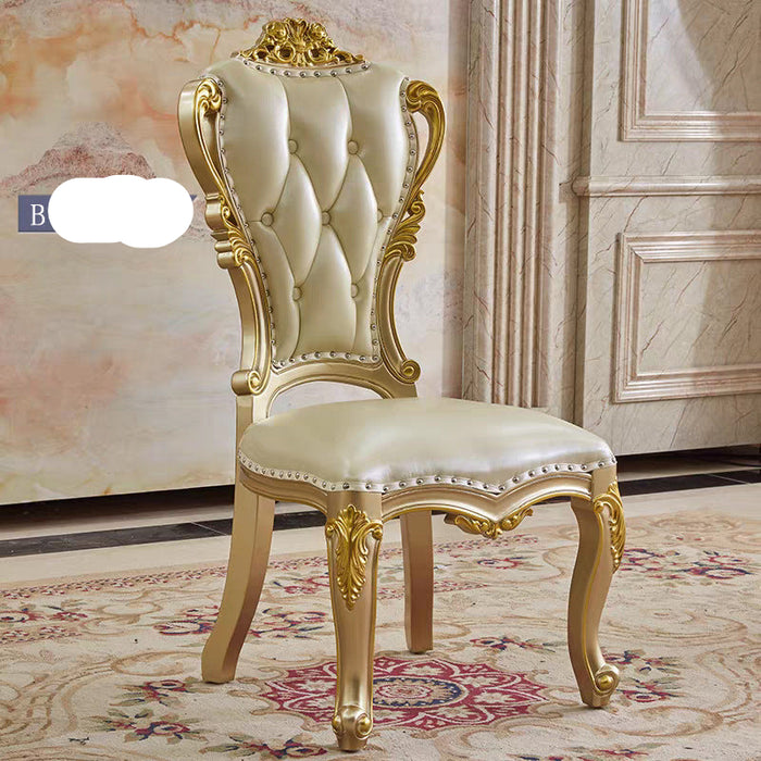 Decorative chair with gold accents in a room with patterned carpet and wall.