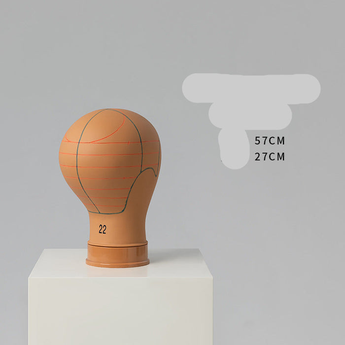 Basketball-shaped head model on a gray background with text indicating dimensions.