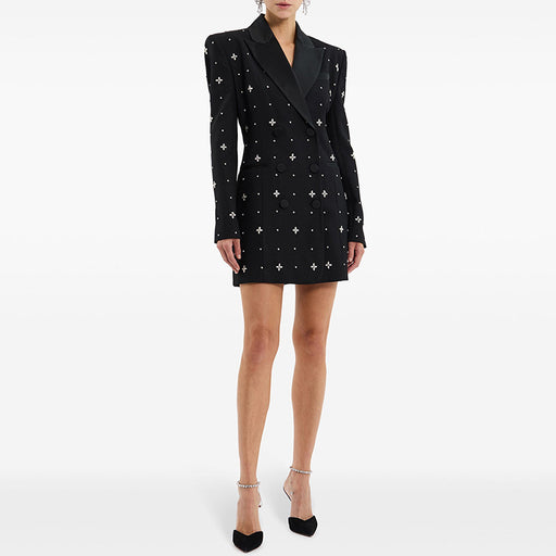 Black blazer dress with star patterns on a white background