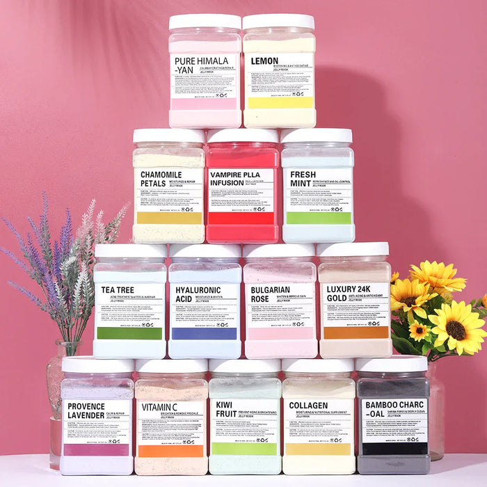 Stack of skincare product jars with visible labels on a pink background