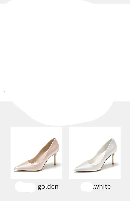Two pairs of high-heeled shoes in gold and white on a plain background.