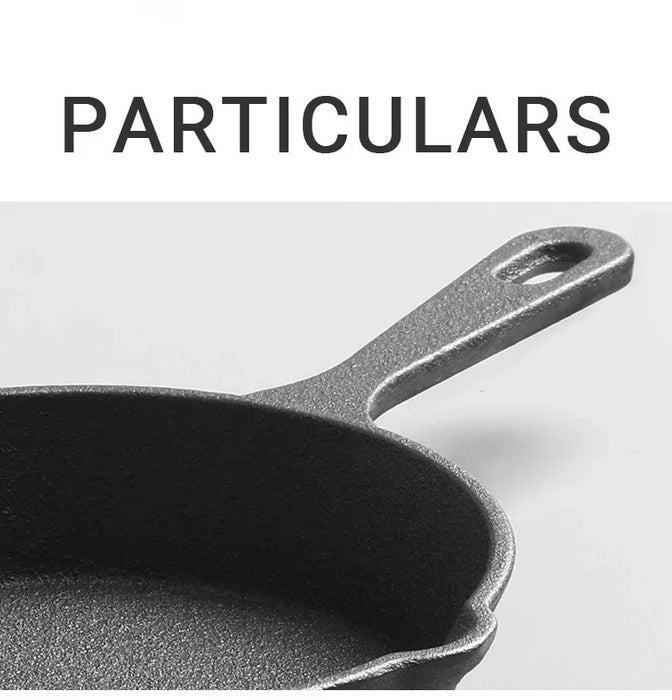 Black cast iron skillet on a light gray background with 'PARTICULARS' text above.