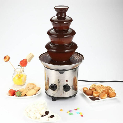 Stainless steel chocolate fountain on a white background