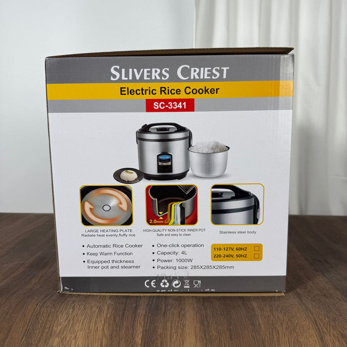 Slivers Priest electric rice cooker packaging on a wooden surface with a white curtain background