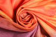 Close-up of orange fabric with a slight texture