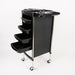 Black rolling cart with multiple drawers and a sink on a white background