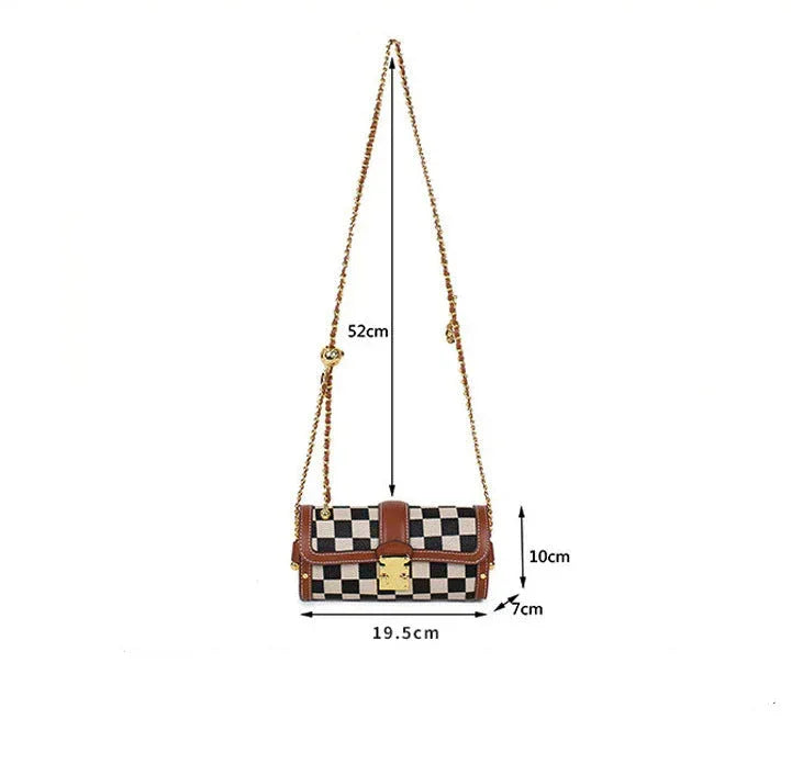 Checkered handbag with chain strap and measurements on a white background
