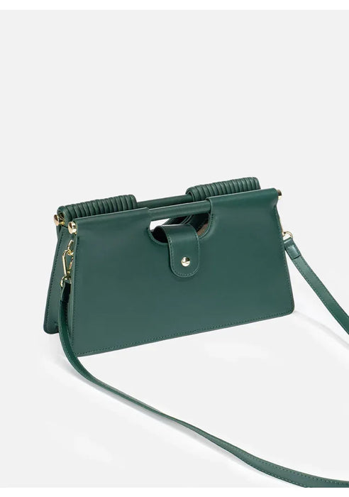 Green handbag with a strap on a white background