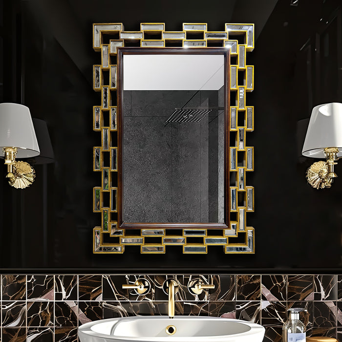 Decorative mirror with gold frame in a bathroom setting