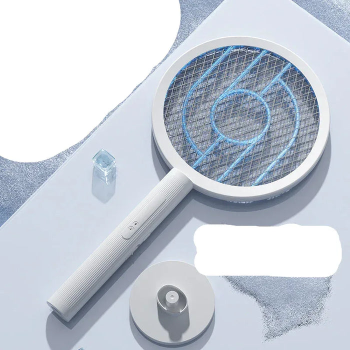 Electric fly swatter with mosquito net on a light gray background
