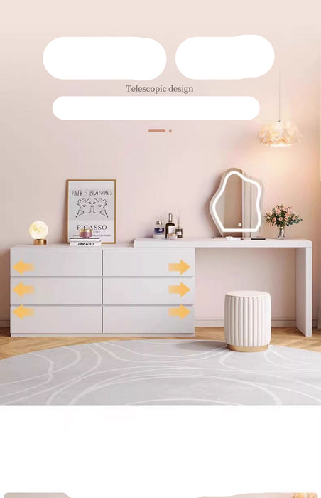 Modern bedroom furniture set with a dresser, mirror, and stool on a light wood floor.