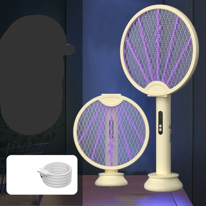 Mosquito zapper with purple light on a dark background