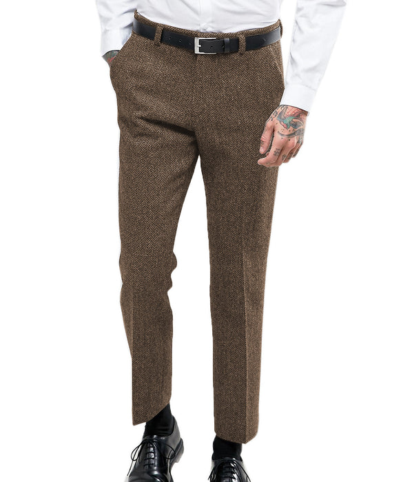 Brown tweed pants worn by a person on a white background