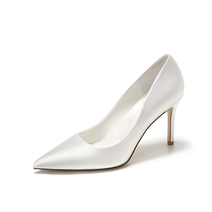 White high-heeled shoe on a white background