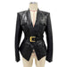 Black leather jacket with gold buckle on a mannequin against a white background