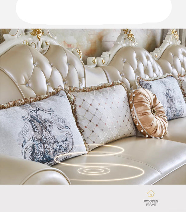 Luxury sofa with decorative pillows and 'Woden' branding.