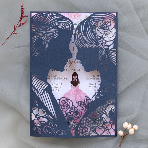 Invitation card with silhouettes of a couple and floral designs on a textured fabric background.