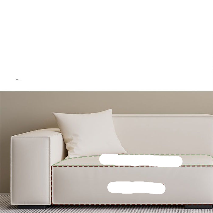 White sofa with a white pillow on a neutral background, featuring Chinese text.