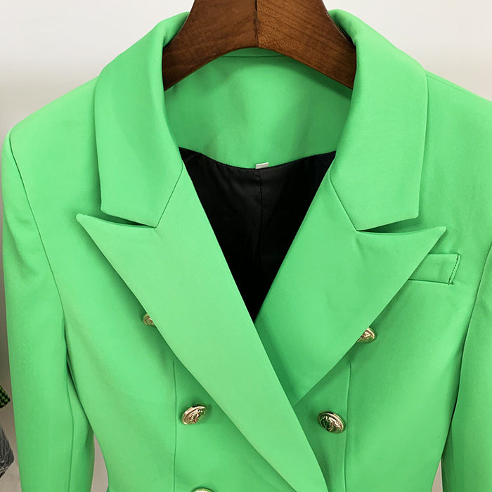 Green coat with gold buttons on a wooden hanger against a white background