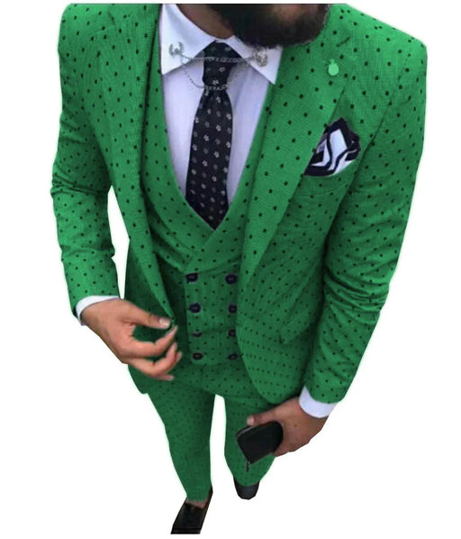 Green polka dot suit with a white shirt and black tie on a white background