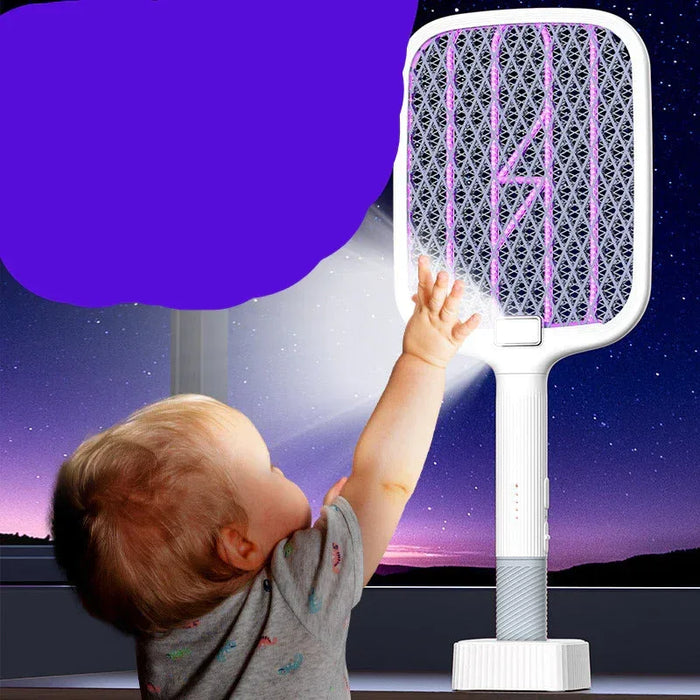 Child holding a fly swatter with a starry night background