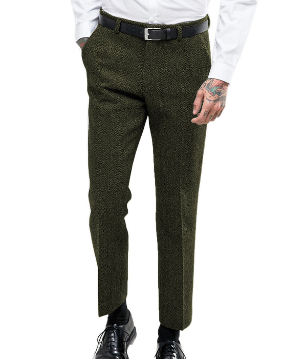 Green herringbone dress pants worn by a person on a white background
