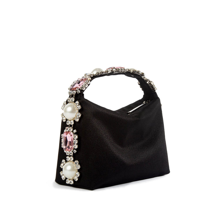 Black handbag with decorative gemstones on a white background