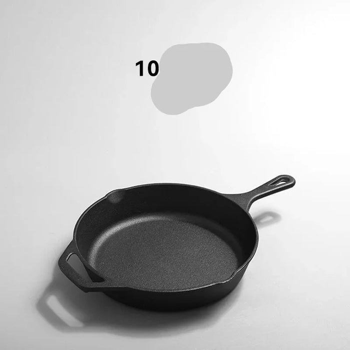 Black cast iron skillet on a light gray background with text