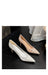 Two high-heeled shoes on a dark floor with text overlay