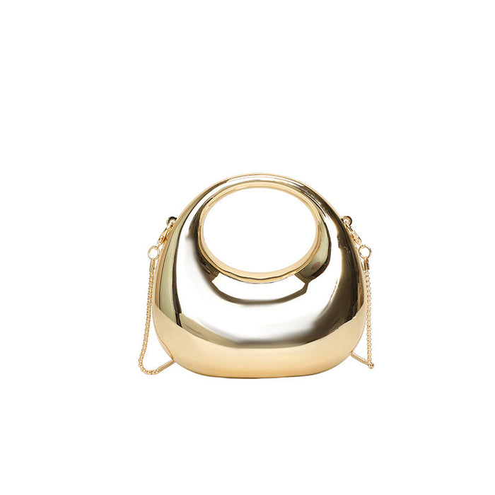 Gold handbag with a chain strap on a white background