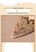 Elegant gold and crystal earring on a textured beige background with text about comfort and artistry.
