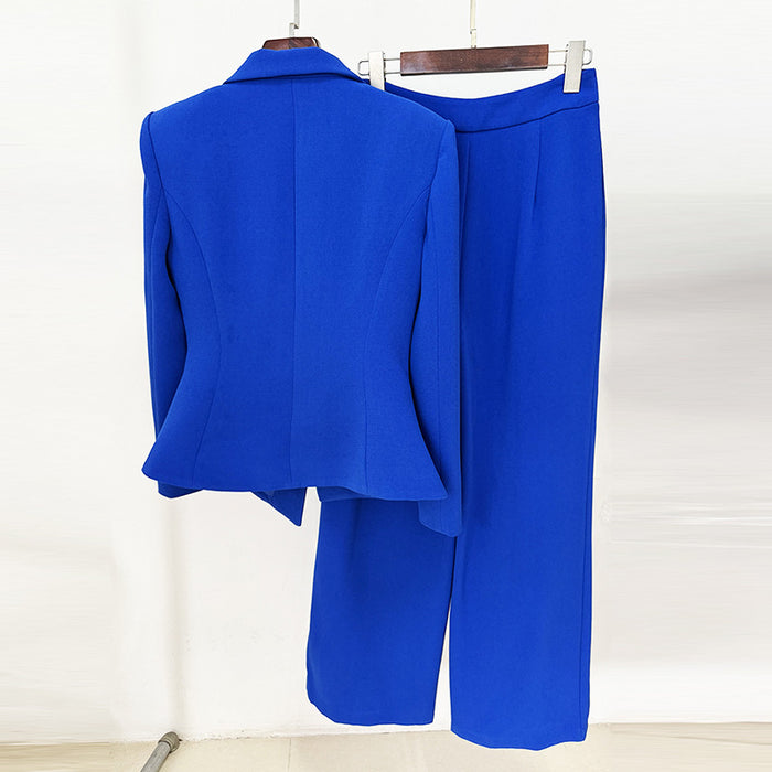 Blue suit on a hanger against a white background