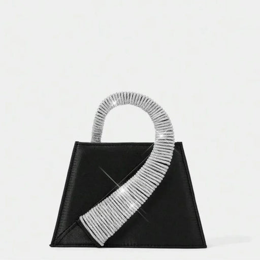 Black handbag with a silver, ribbed handle on a white background