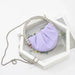 Purple handbag with a chain strap on a white background