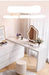 Modern white desk with mirror and decorative items in a room setting