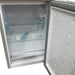 Empty refrigerator with open door on a white background