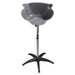 Gray hair washing bowl on a black stand against a white background