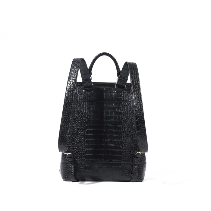 Black crocodile-patterned backpack on a white background