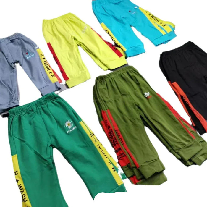 Collection of colorful pants with side stripes on a white background