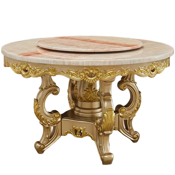 Decorative round table with marble top and gold ornate base on a white background