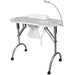 Portable nail table with marble pattern top on a white background