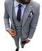 Gray polka dot suit with a tie on a white background