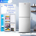 CHIGO refrigerator with open door showing interior and specifications on a light blue wall background.