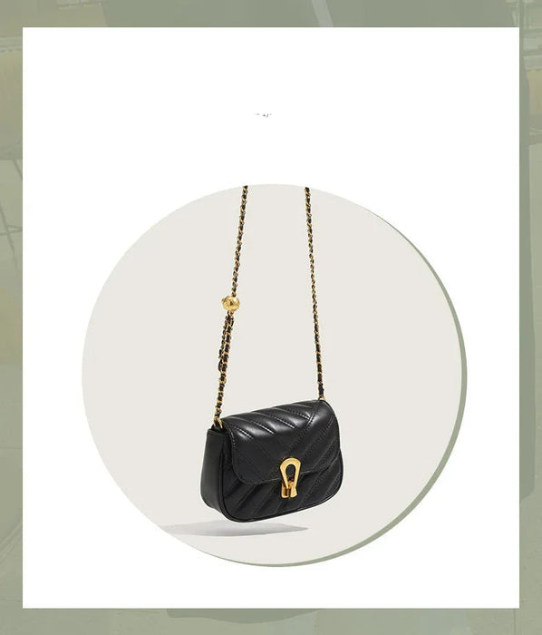 Black handbag with a chain strap on a white background
