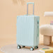 Light blue suitcase on a beige background with a chair and books.